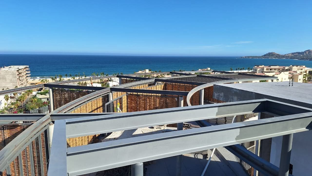 Fachada curva del desarrollo residencial Punto Nima en San José del Cabo